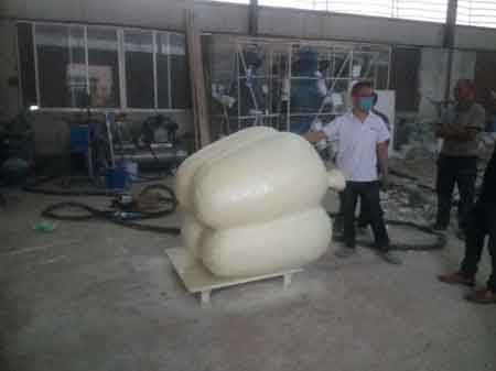 Polyurea spraying sculpture surface